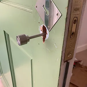 a door handle with a hole in it